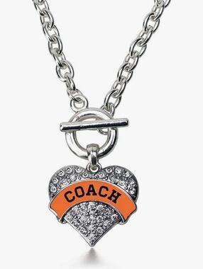 Coach Silver-Tone Crystal Heart Necklace with Orange Logo Banner